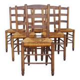 Set of six rush-seated ladderback chairs.