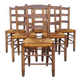 Set of six rush-seated ladderback chairs.