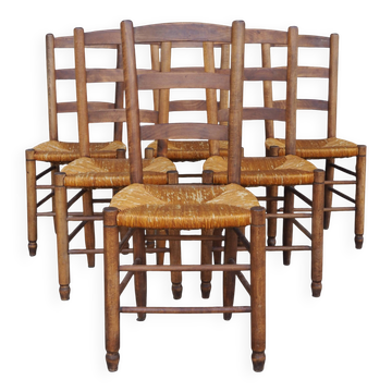 Set of six rush-seated ladderback chairs.