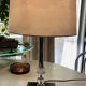 Silver-plated metal lamp base with crystal.