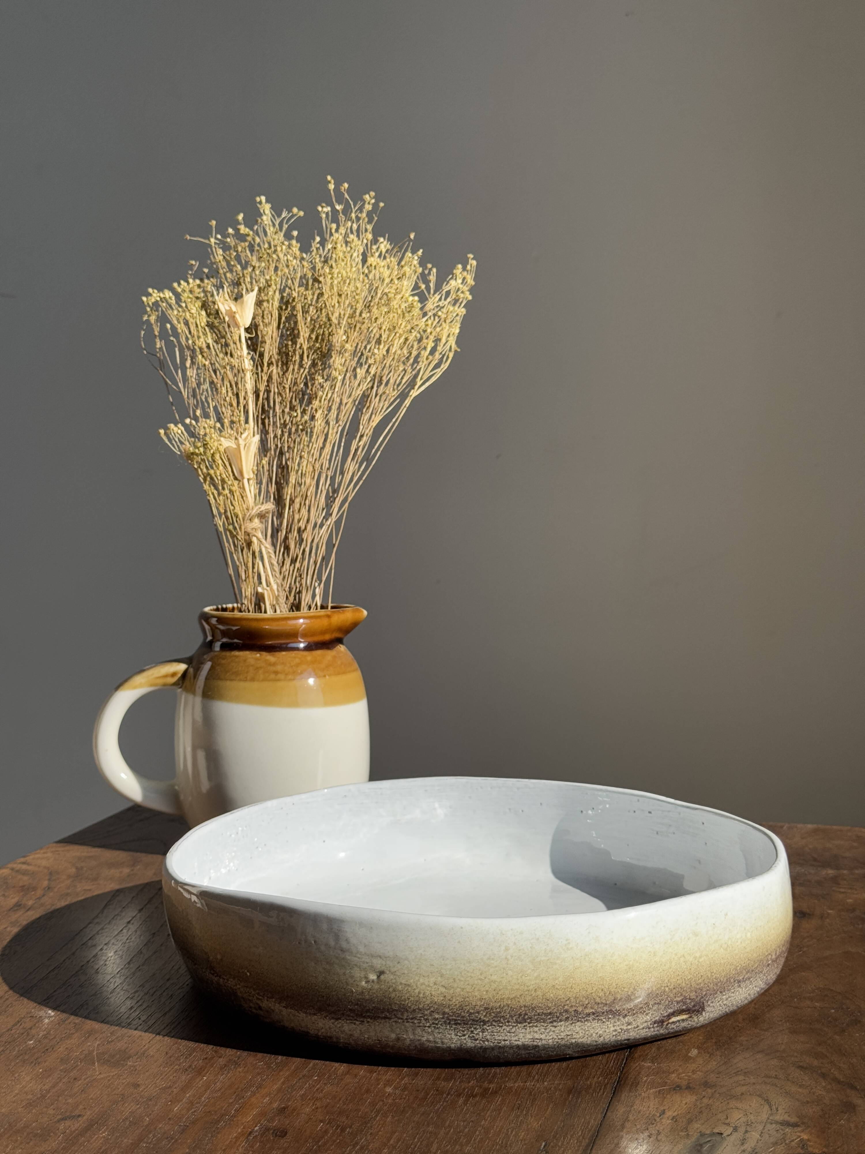 Large white and earthenware ceramic dish