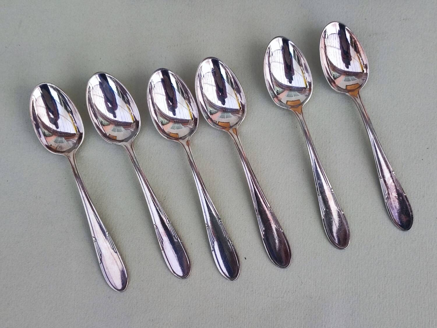 Six silverplated teaspoons