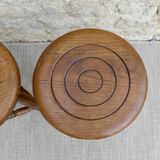 Pair of solid wood tripod stools, carved.