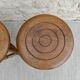 Pair of solid wood tripod stools, carved.