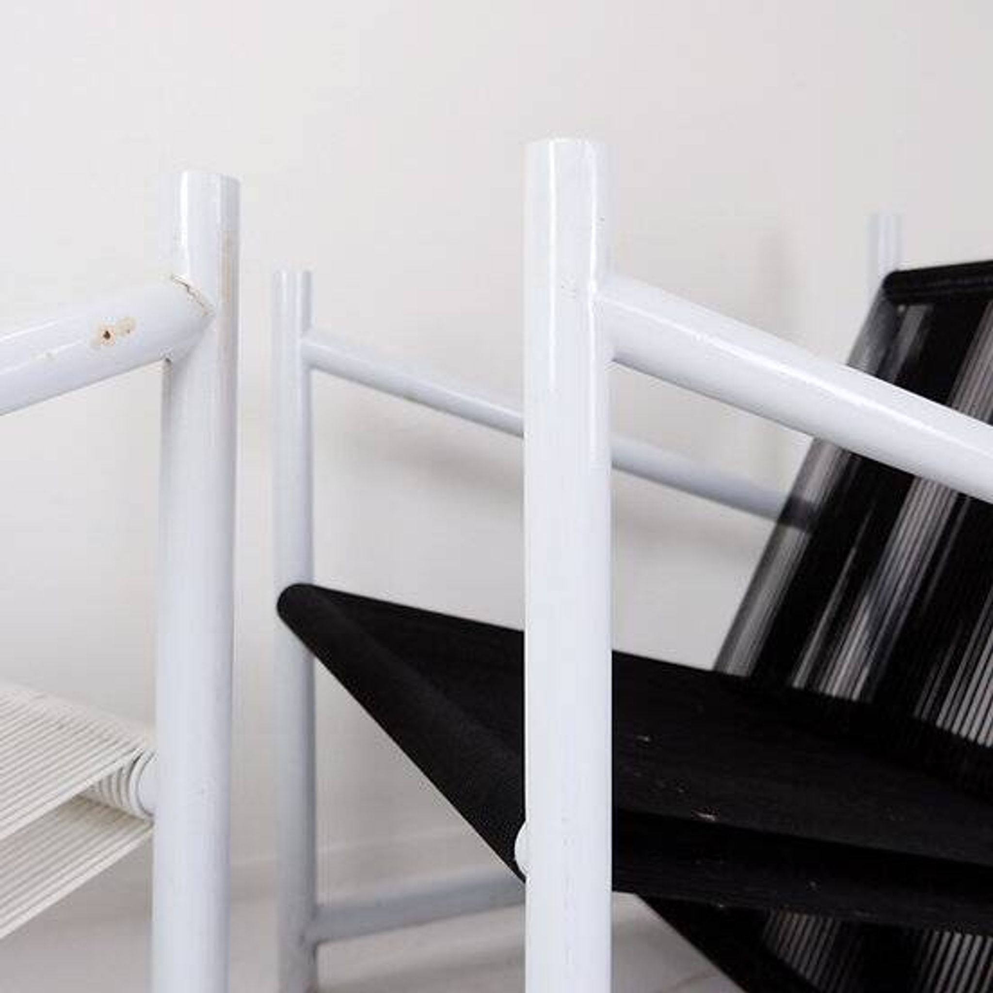 Indoor/Outdoor pair of Black/White Armchairs