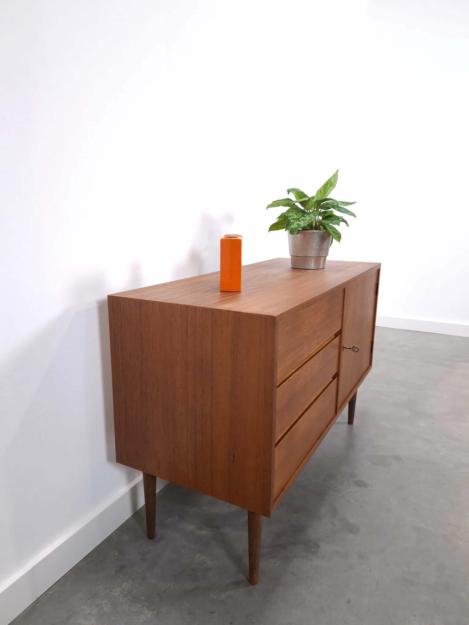 Vintage teak cabinet from the 1960s, sideboard with 3 drawers and a door.