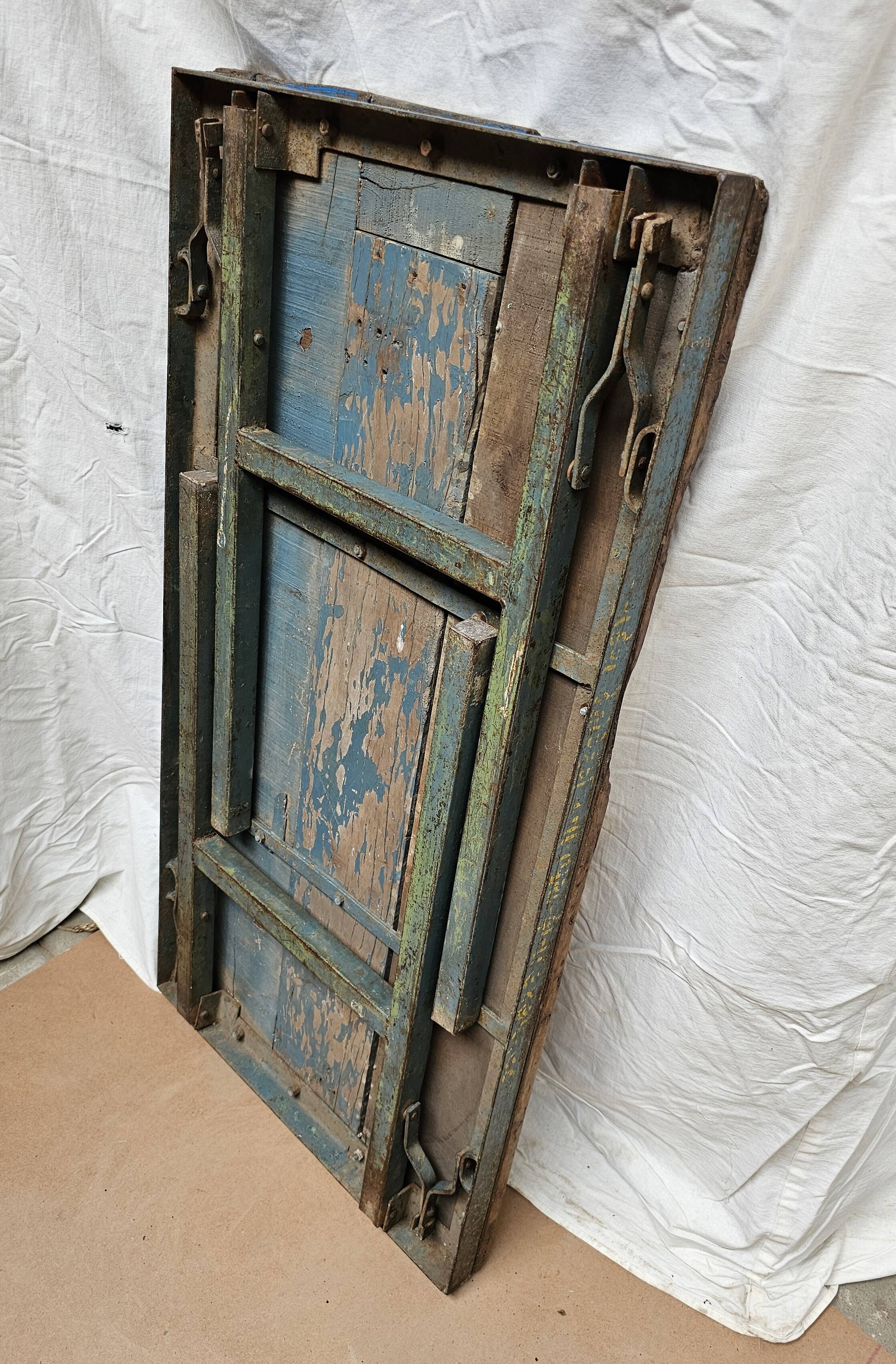 Folding workshop table in teak and wrought iron