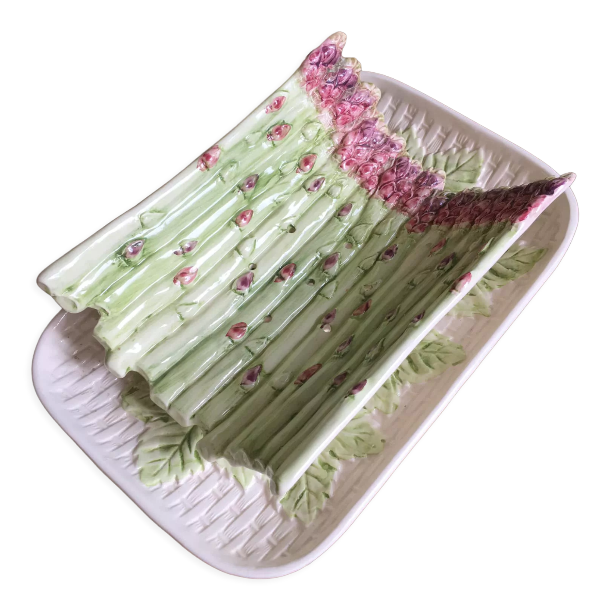 Service à asperges composé d’un plat et son égouttoir en barbotine. Estampillé FG
