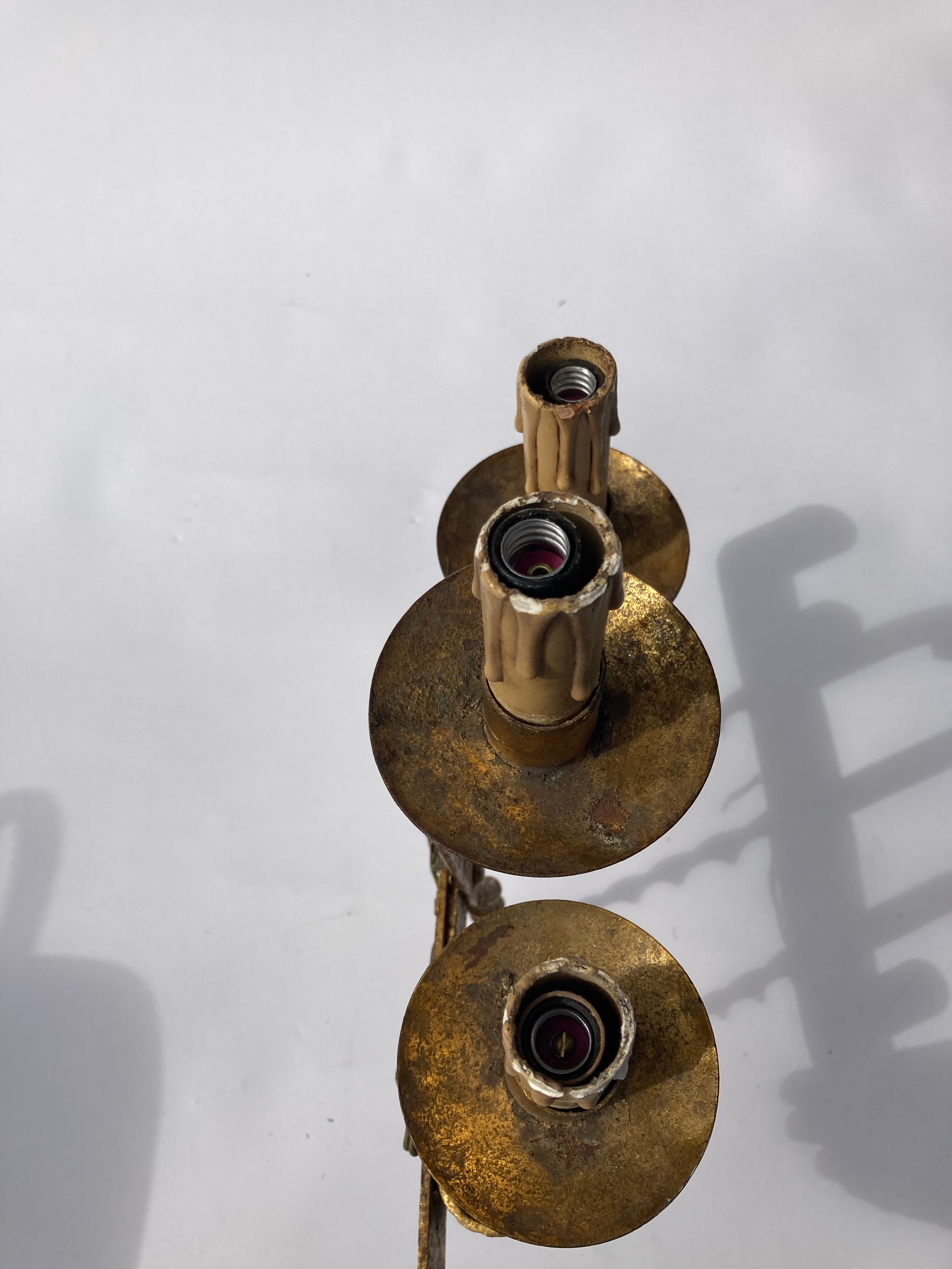 Wrought iron wall sconce brutalist