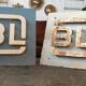 Old metal factory sign