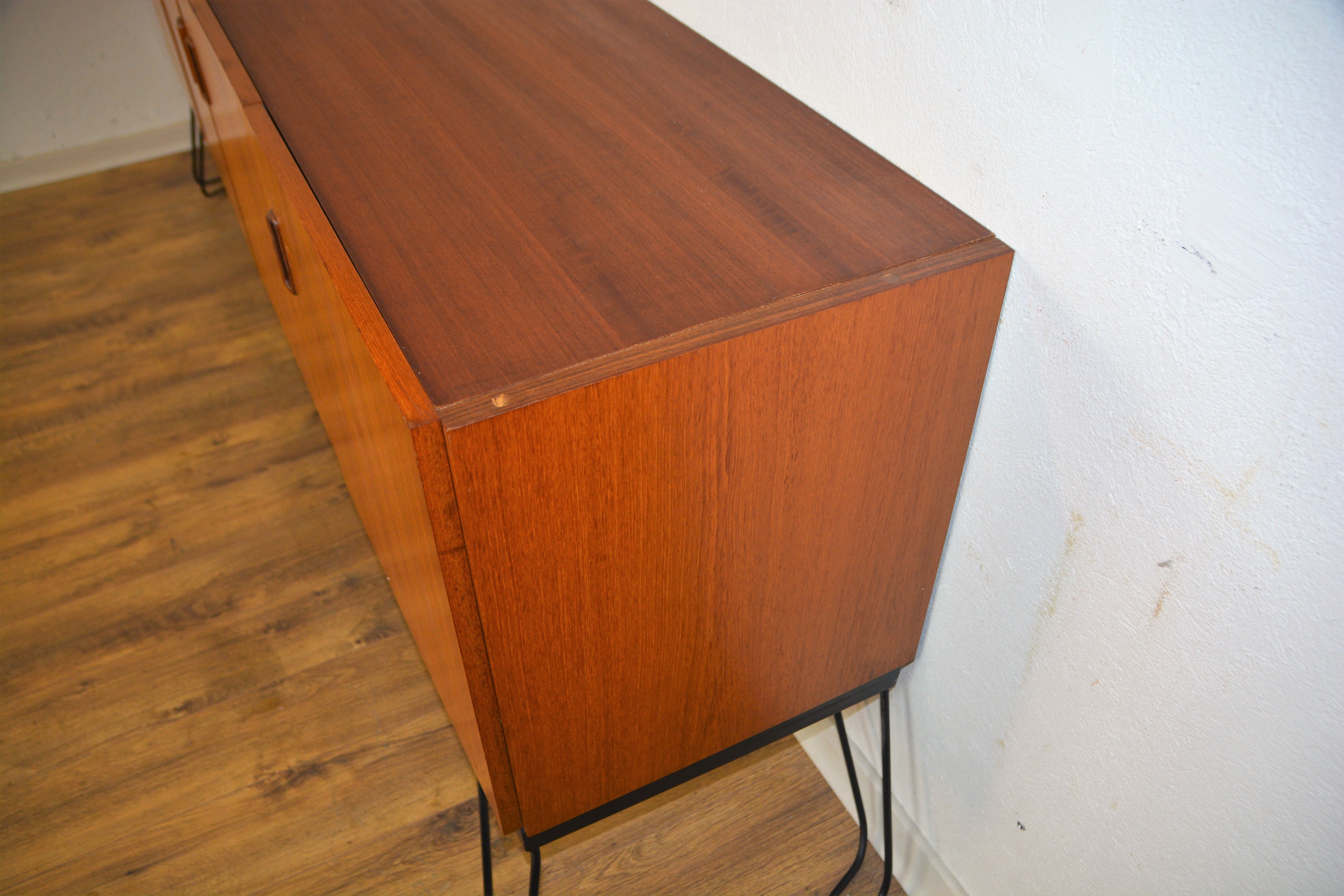 Scandinavian teak metal foot row