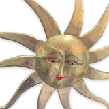 Sun in gilded wood