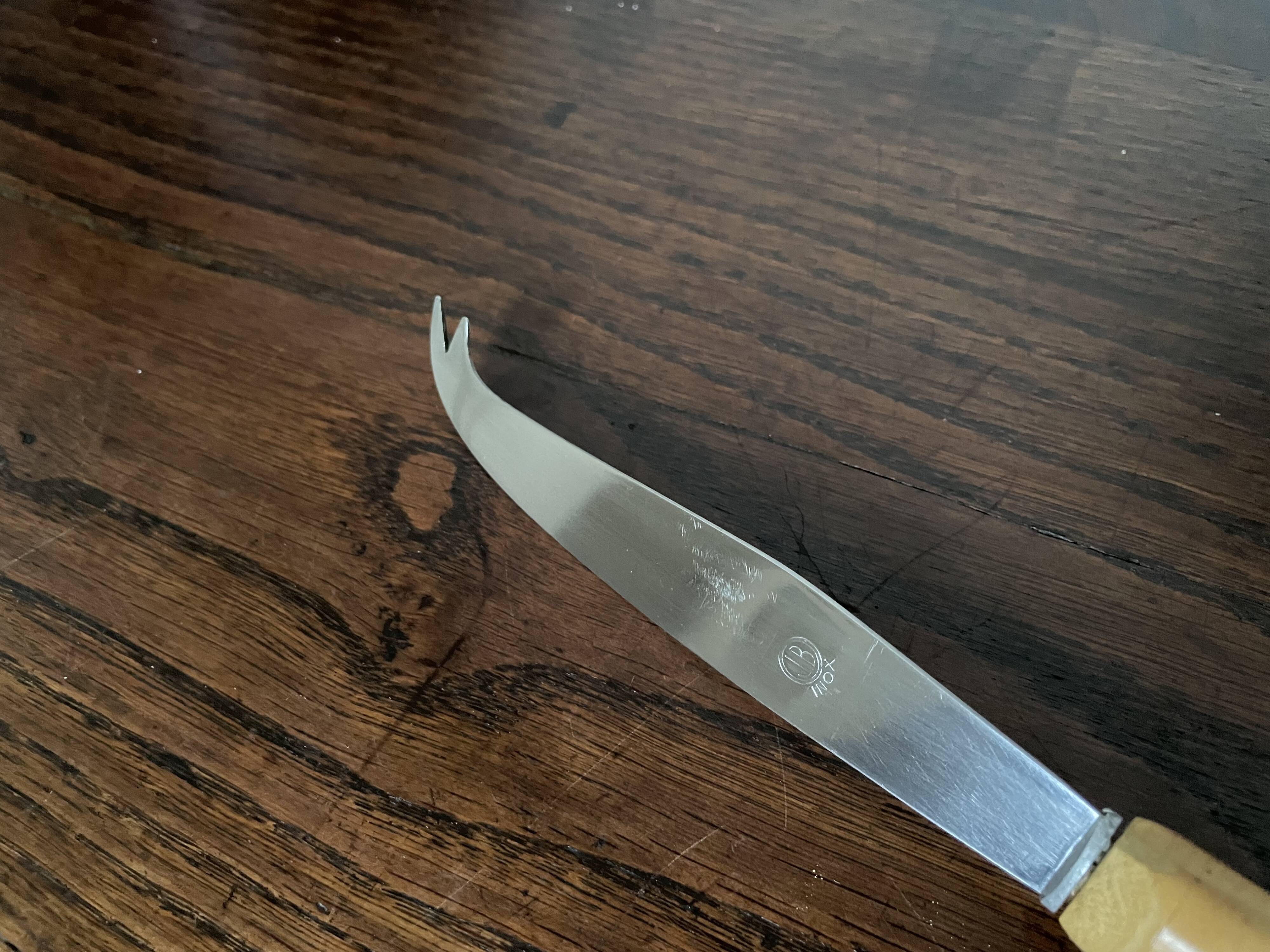 Bamboo handle cheese knife