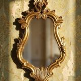 Vintage Rococo wall mirror, gold, Italy, circa 1950-1970, wood and gilded stucco.