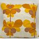 Coussin vintage orange  / marron fleurs stylisées