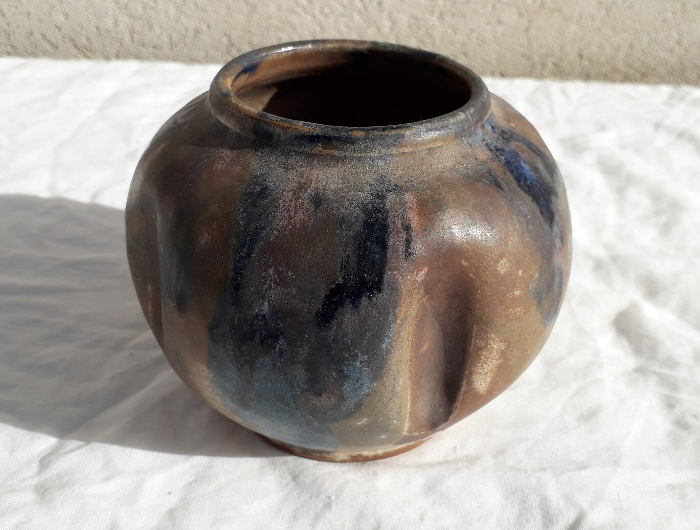Signed stoneware ball vase