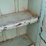 Old wooden cabinet with beautiful green patina