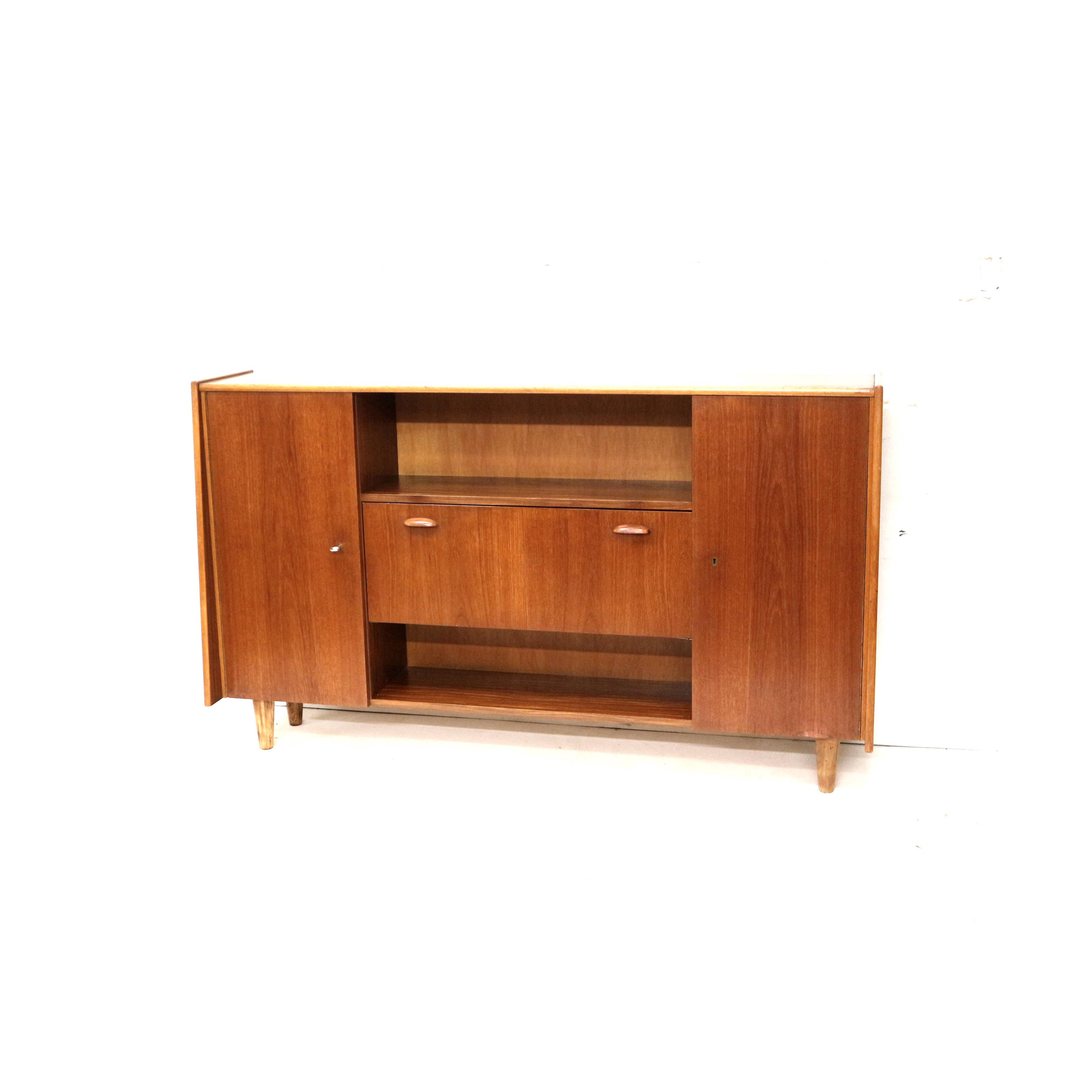 Vintage wall-mounted sideboard with teak wood flap made in the 1960s