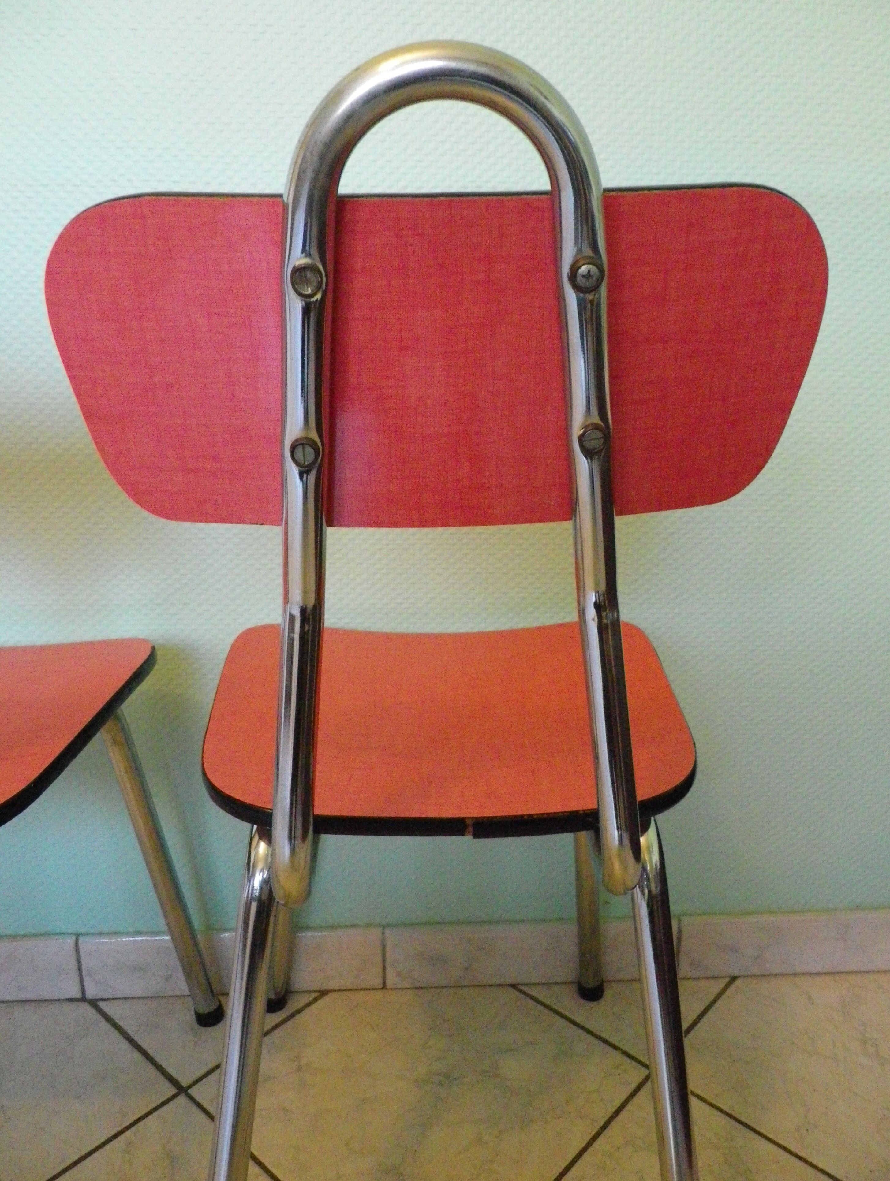 Lot of 2 chairs in red formica with tubing 60s