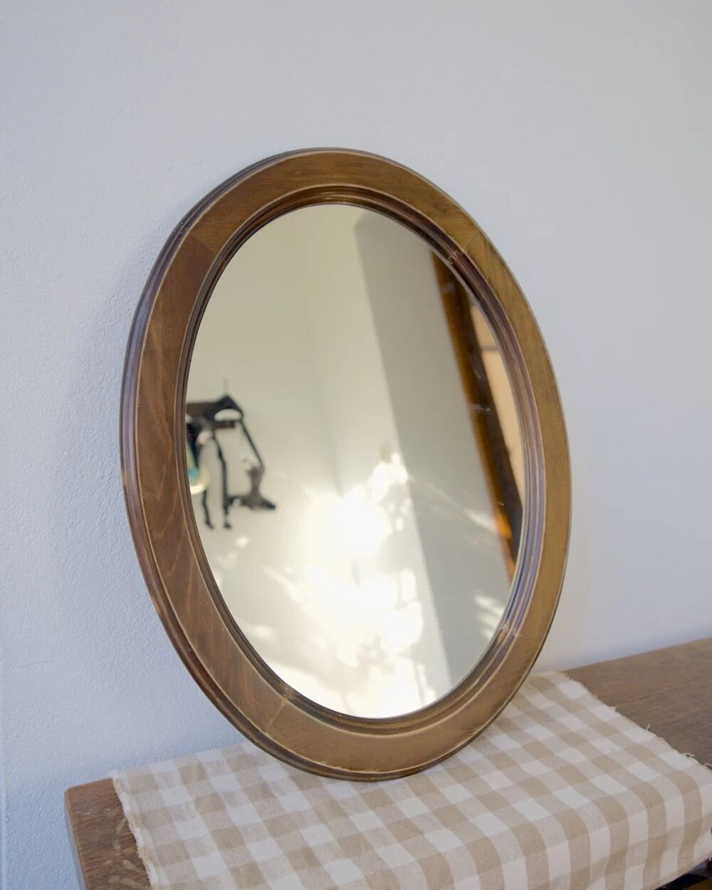 Oval wooden mirror