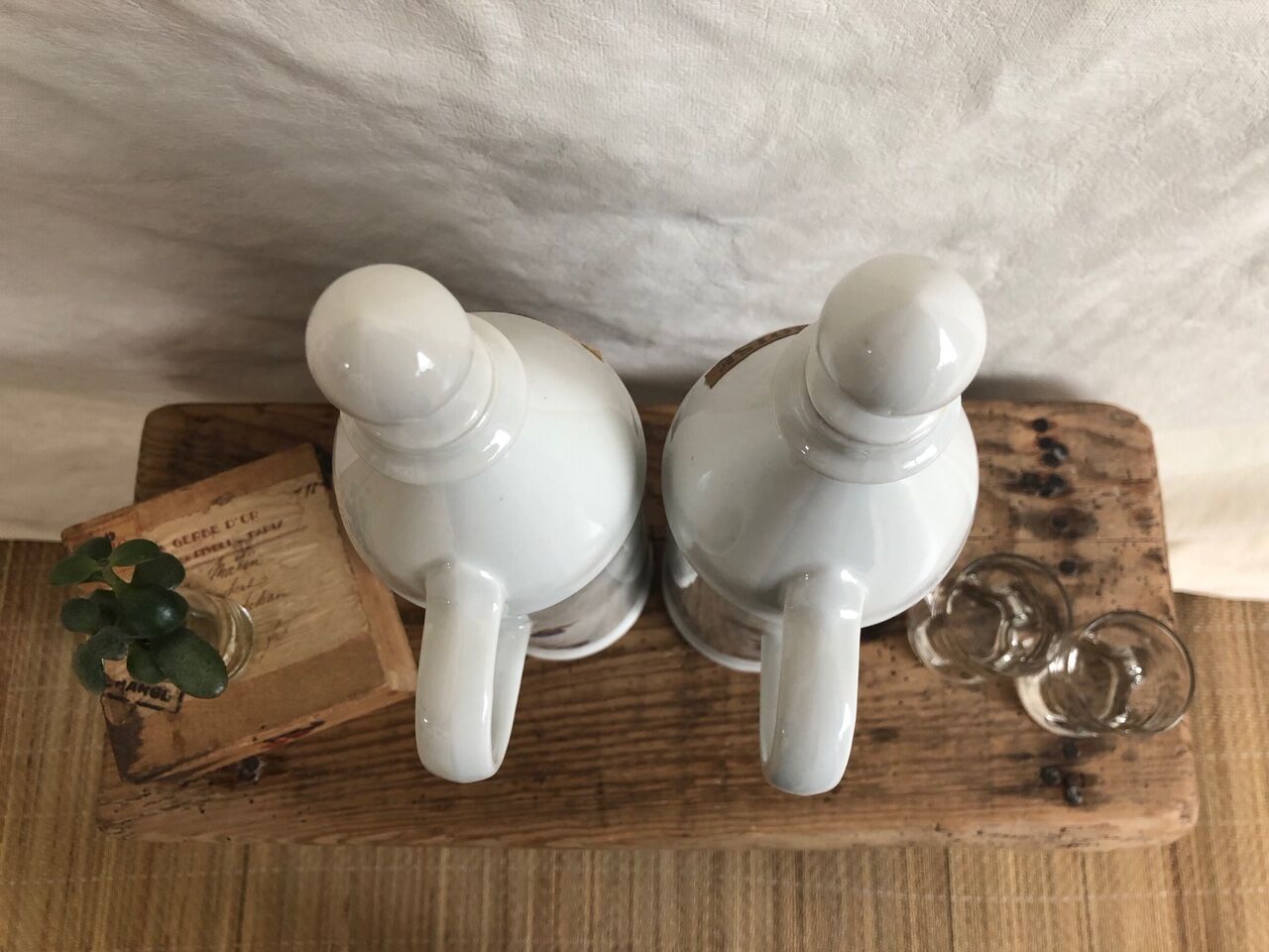Porcelain bottle duo for mirabelle and raspberry brandy