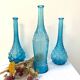 Bouteille en verre d'Empoli bleu, Italie années 60