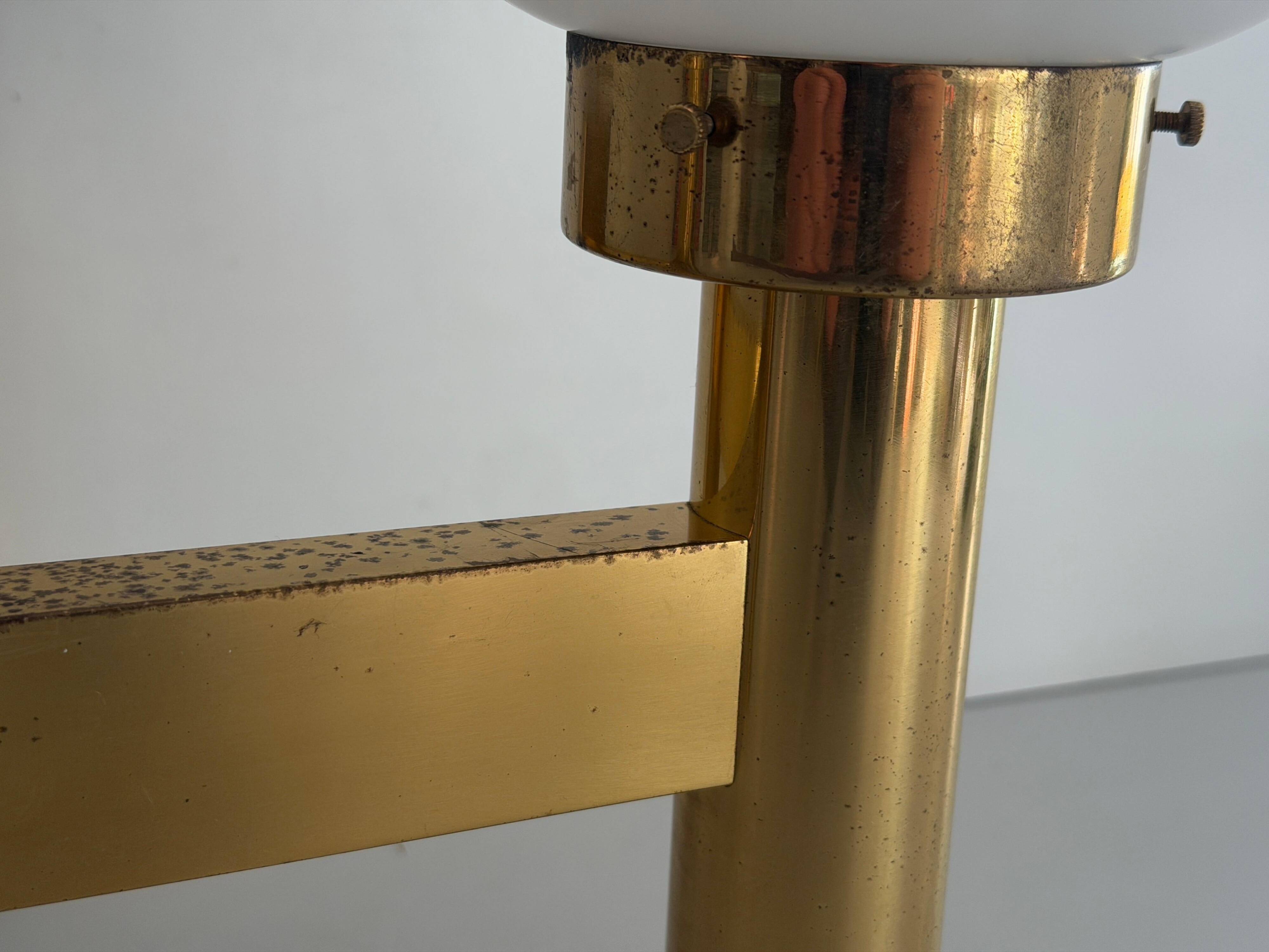Double opal glass and heavy brass, large minimalist cinema wall light, 1960s, Germany