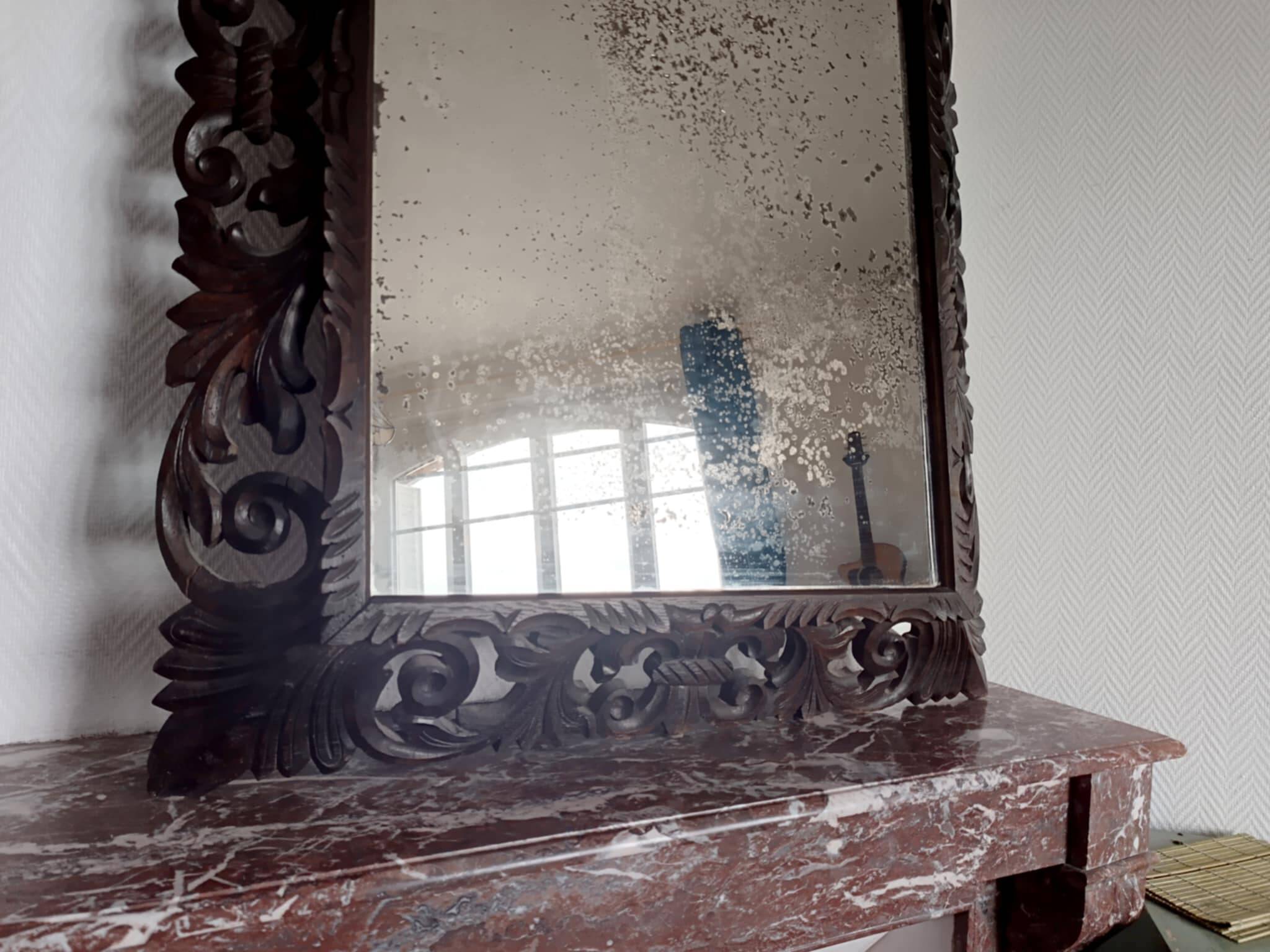 Neo-Gothic mirror in carved oak circa 1940