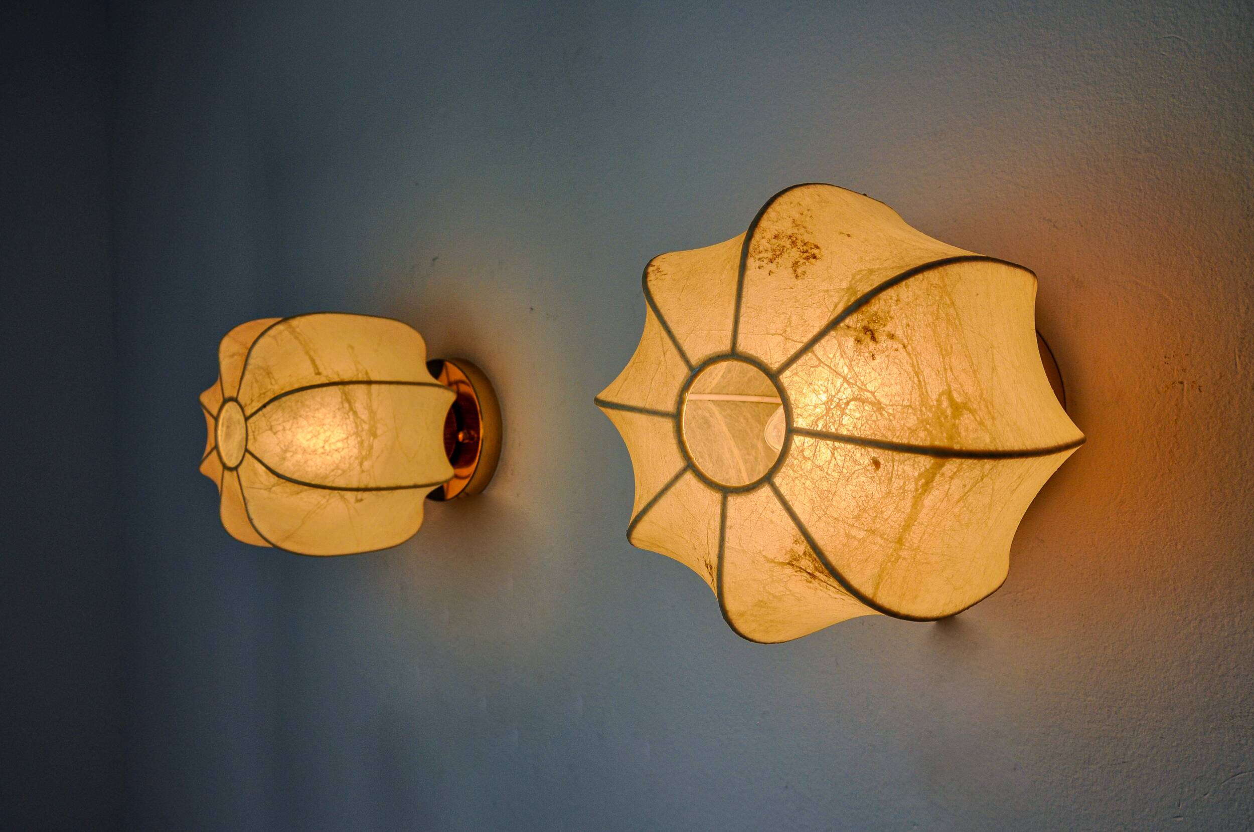 Pair of “cocoon” wall lights, resin and pine, italy, 1970