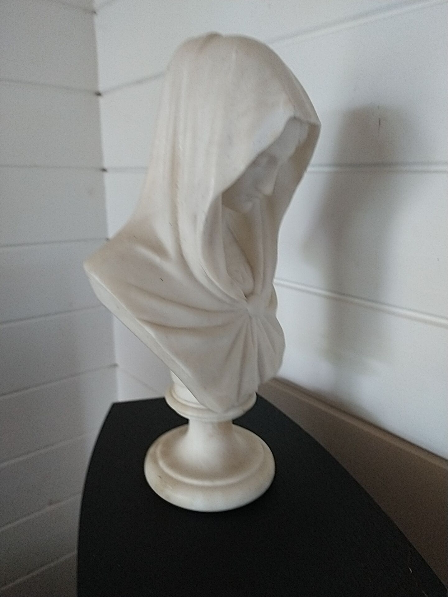 Bust of the Virgin in alabaster by Guglielmo Pugi.