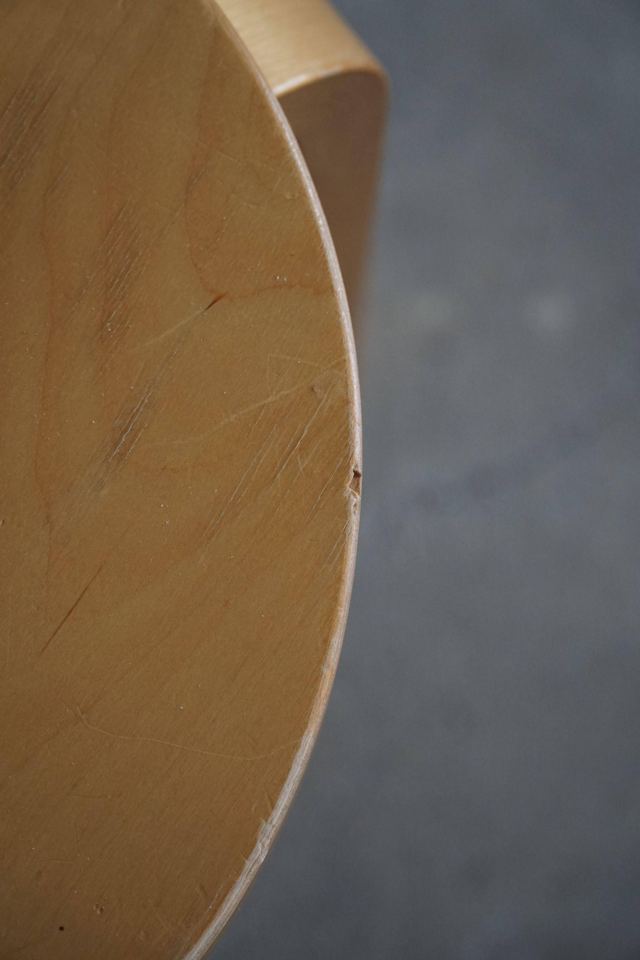 Alvar Aalto, a pair of vintage birch stools, model "60", made by Artek, 1970s.