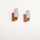 Pair of teak and opaline glass wall lamps, 1950s/1960s