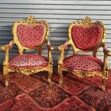 pair of gilded wooden ceremonial chairs