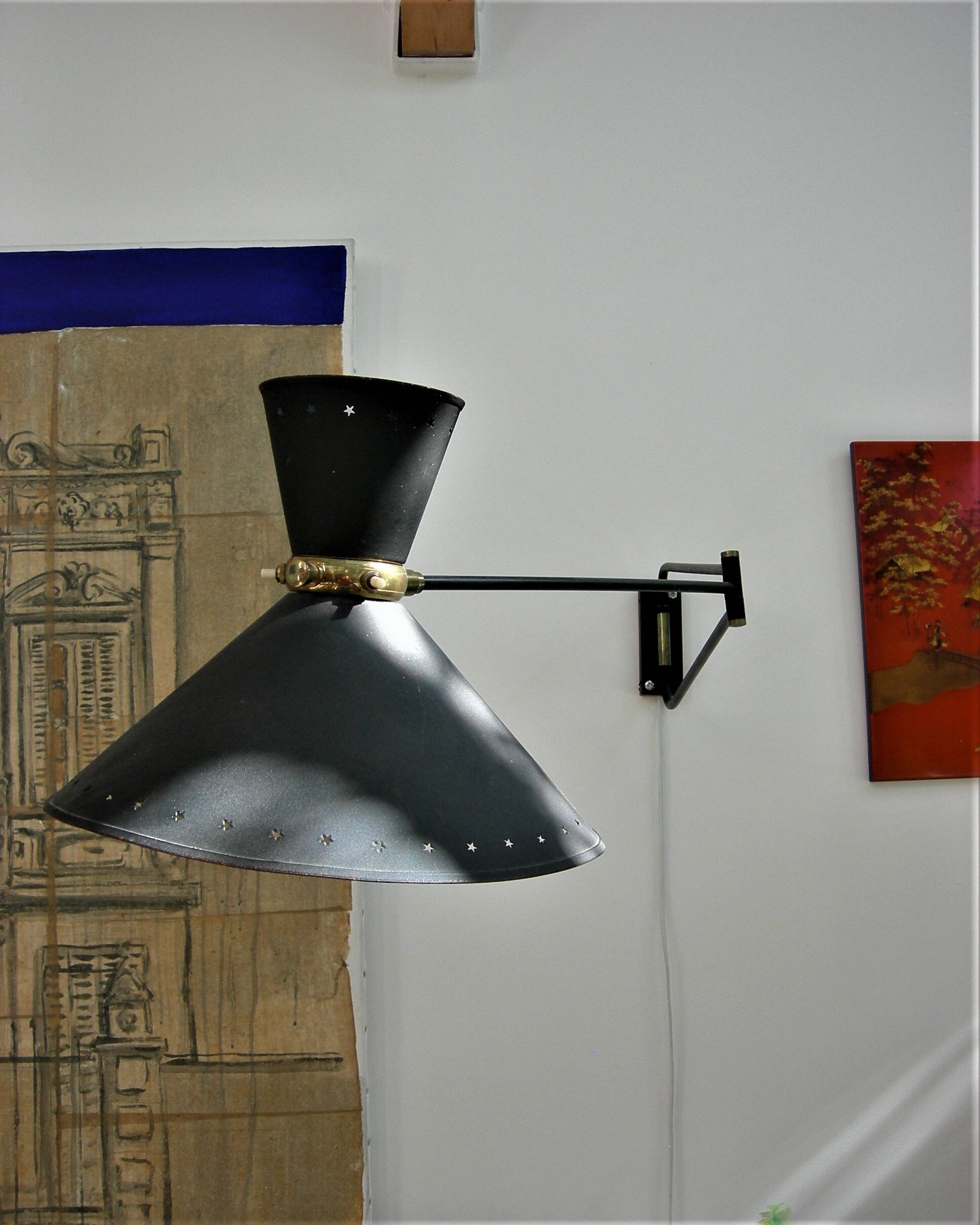 Roger Mathieu's diabolo sconce for Lunel with double lighting