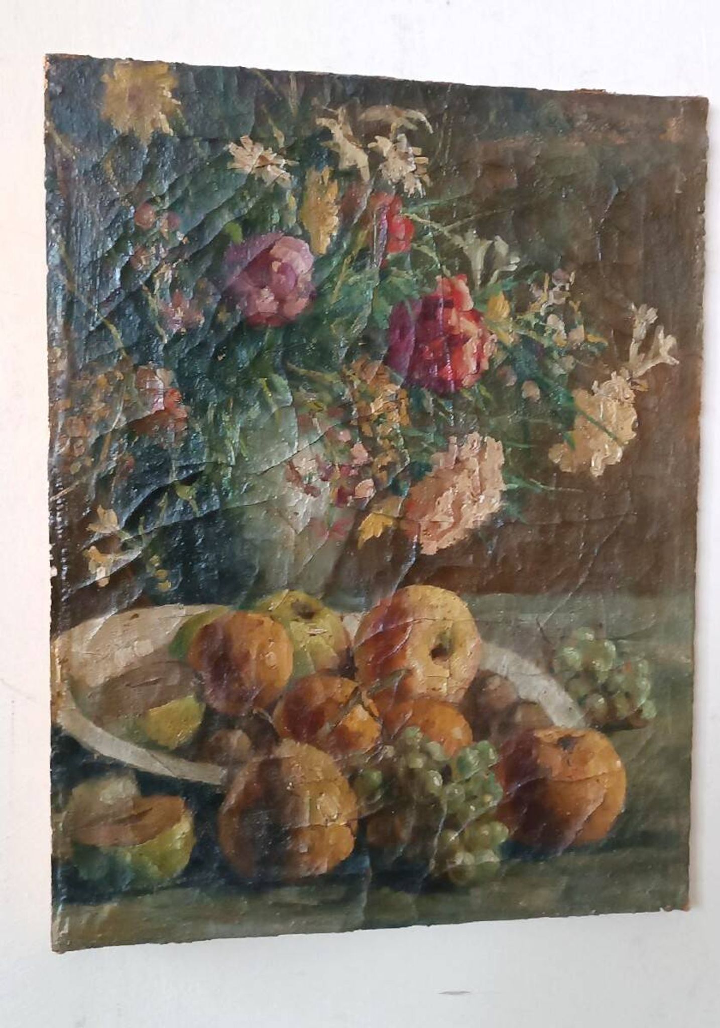 19th-century oil painting on canvas depicting a vase of fruit with flowers.