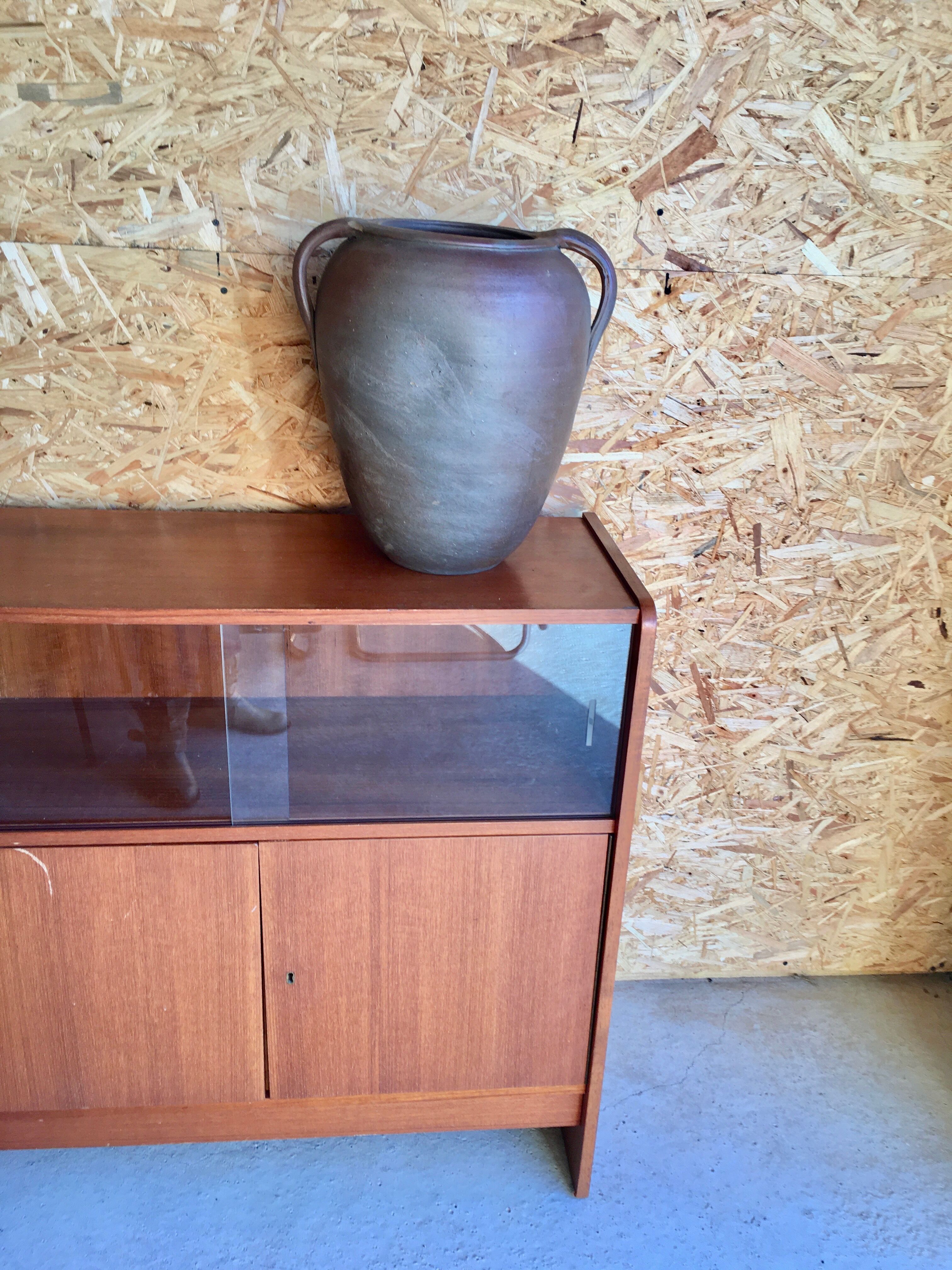 Old jug with two sandstone handles