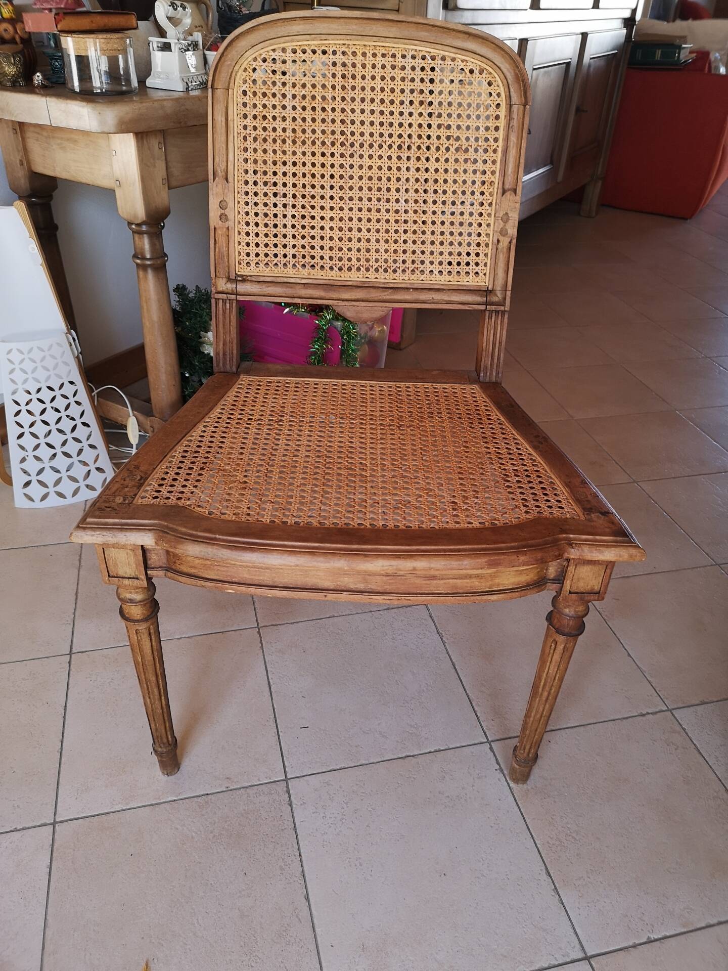 Caned armchair