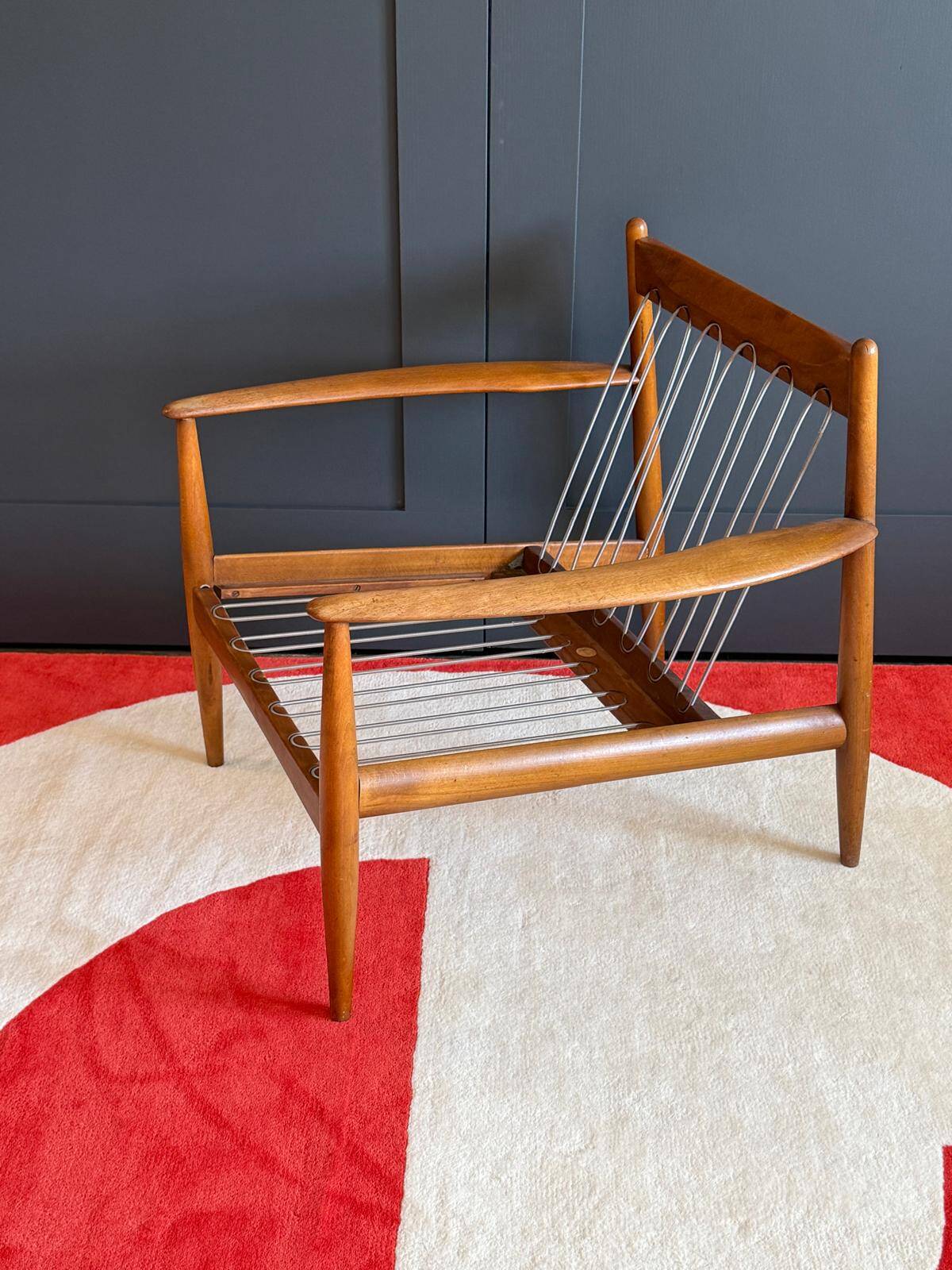 Scandinavian armchair in solid teak by Grete Jalk