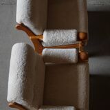 Henning Kjærnulf, lounge chairs in oak and lambswool, mid-century Danish, 1960s.