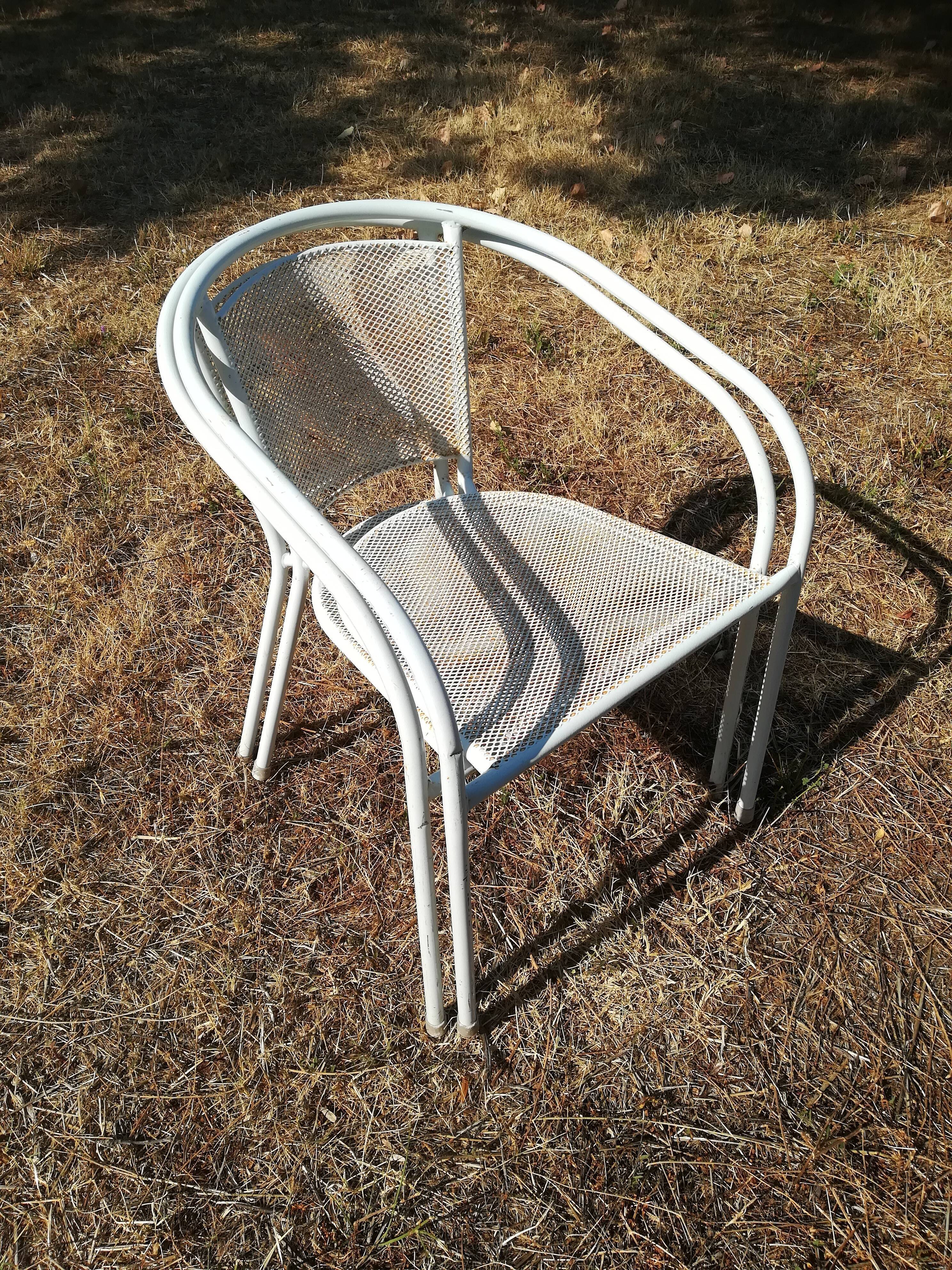 Pair of vintage white metal terrace armchairs