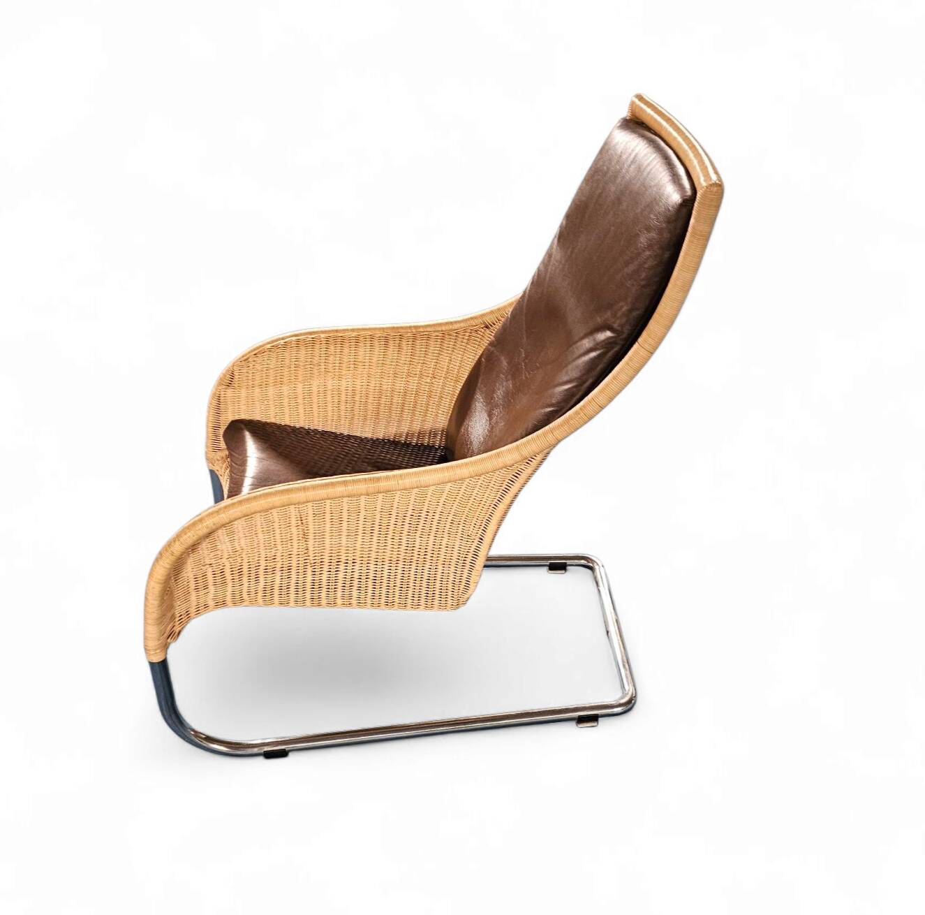 2 x Weighty rattan lounge chair / brown leather 1990s  Very good condition