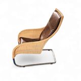 2 x Weighty rattan lounge chair / brown leather 1990s  Very good condition