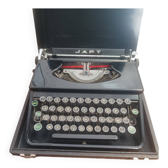 Machine à écrire japy portable ancienne avec son coffre comme neuve