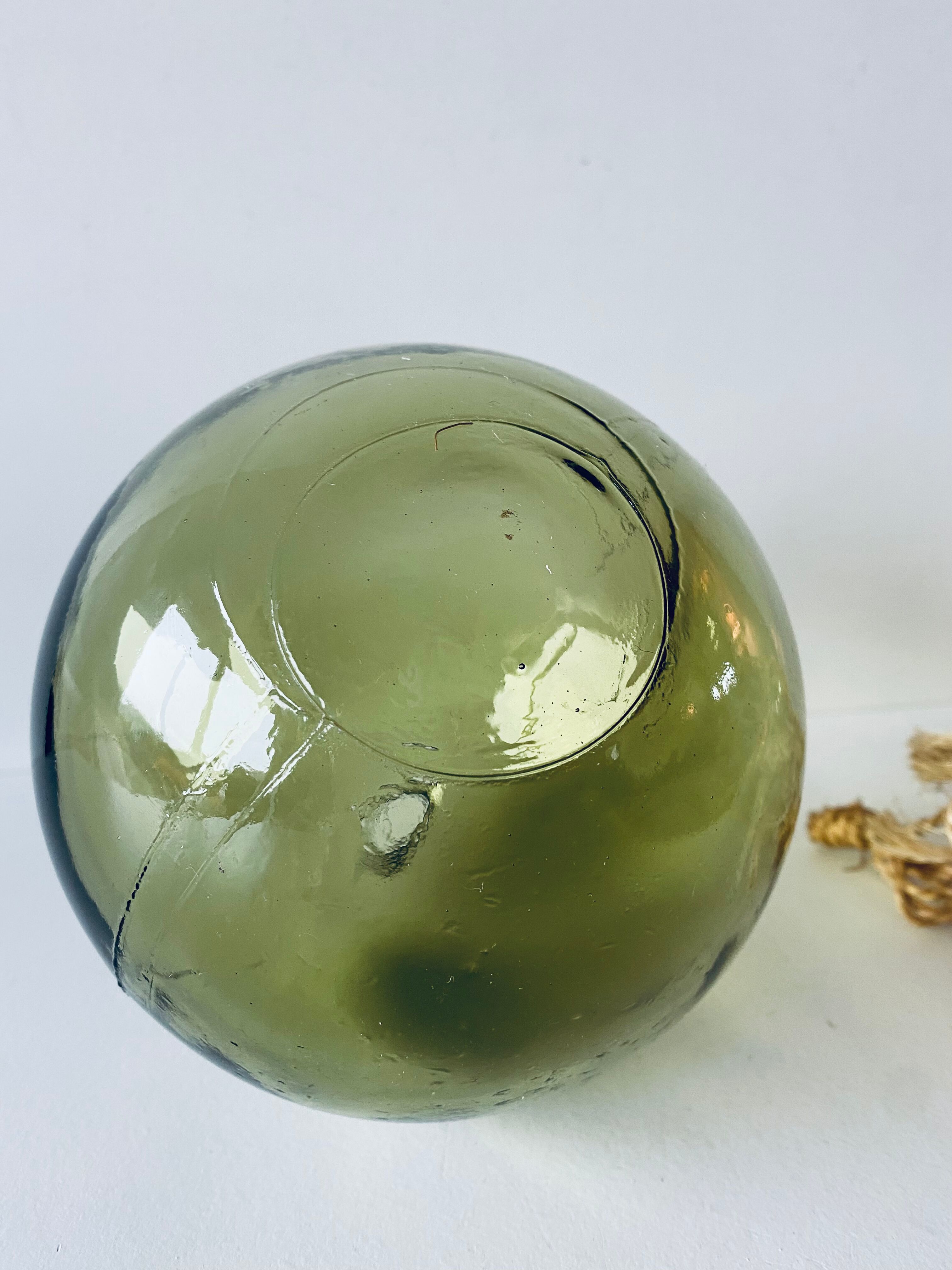 Old glass fishing float