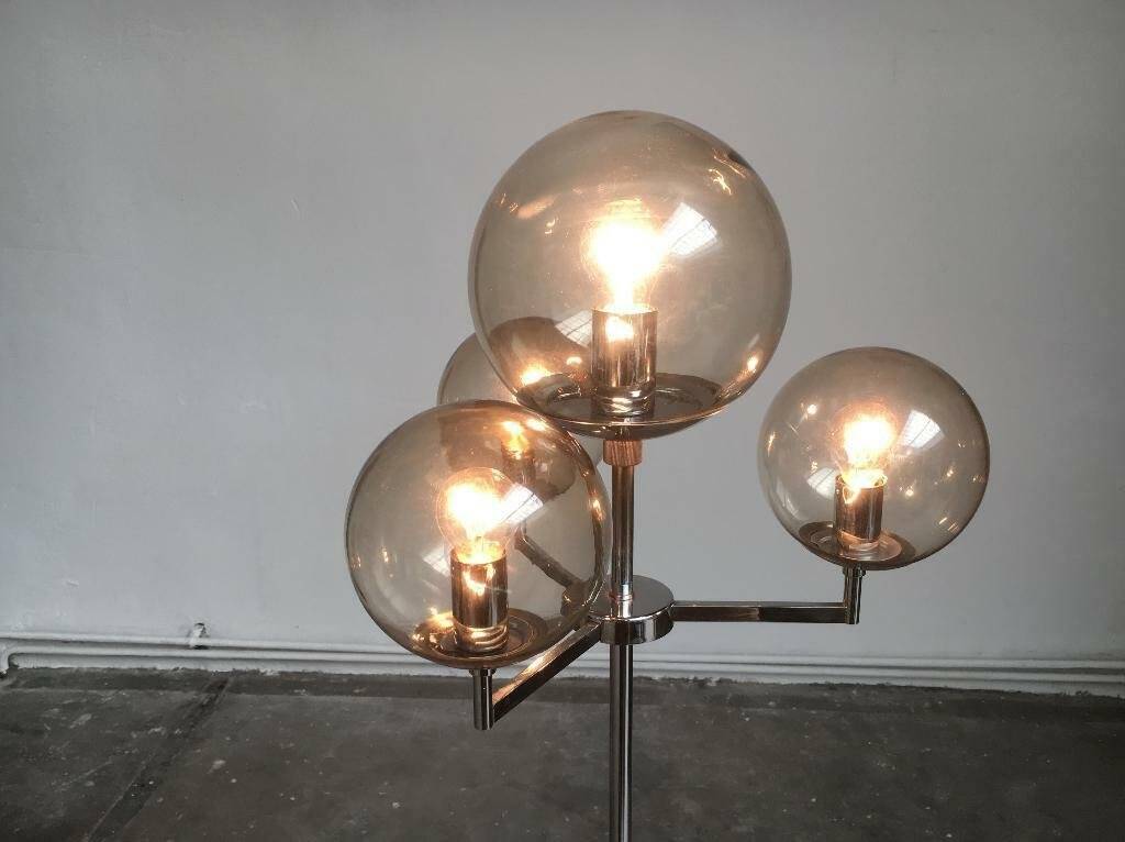 Chrome and glass floor lamp in mid-century German space style by Hustadt Leuchten, 1960s.