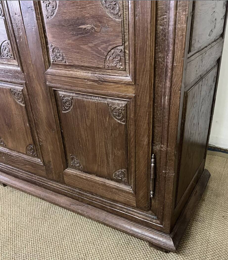 Louis XV carved wooden wardrobe from the 18th century