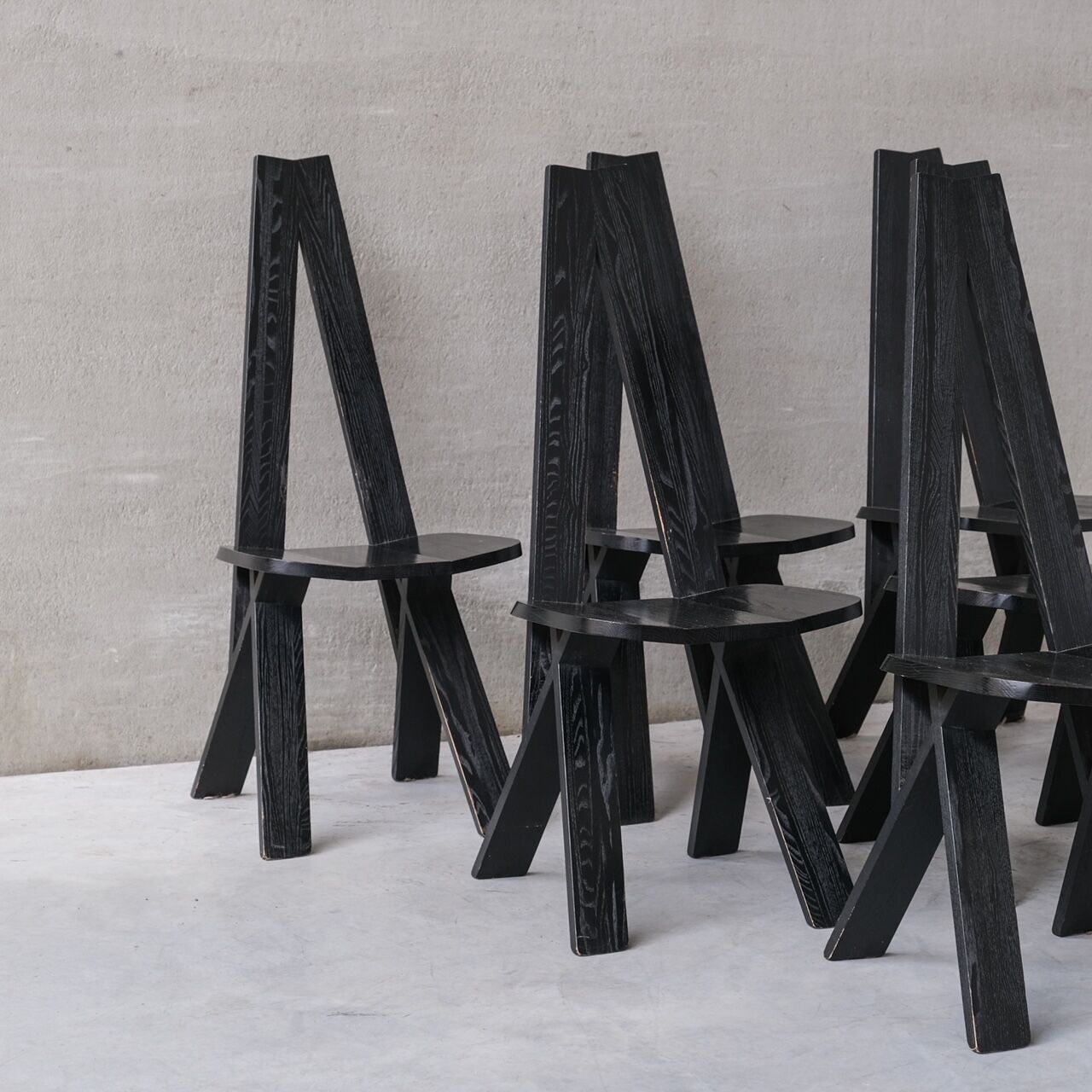 Set of six black dining chairs