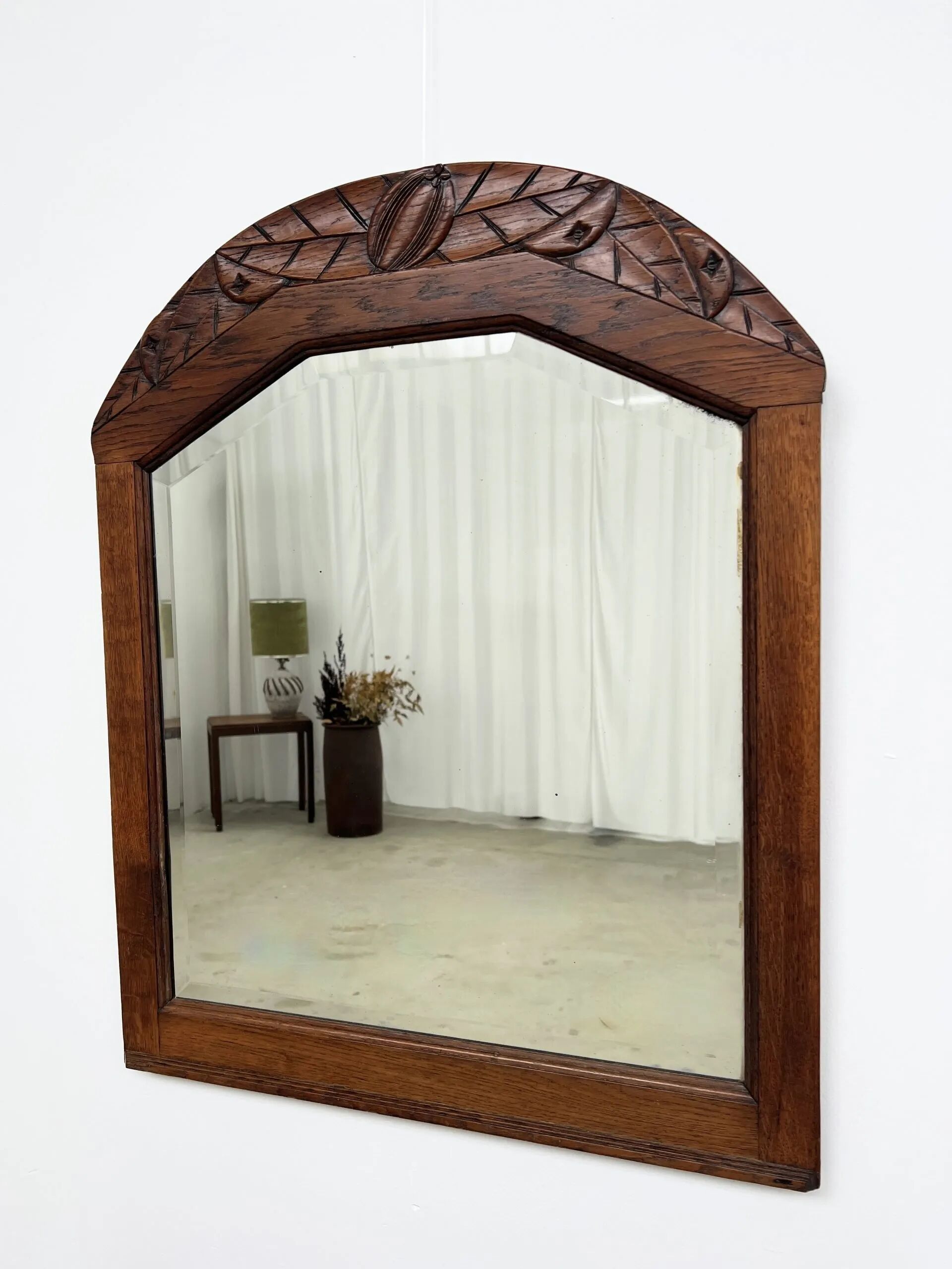 Art Deco oak mirror with carved motif
