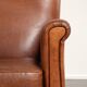 Sturdy vintage sheepskin armchair with a beautiful cognac colour