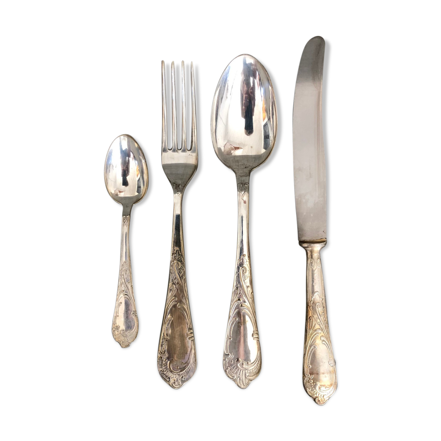 Series of 24 antique silver metal cutlery